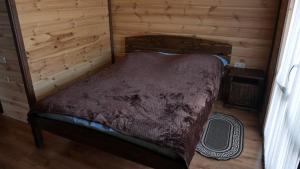 Postel nebo postele na pokoji v ubytování Hirska Kazka