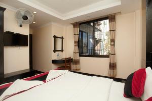 Voodi või voodid majutusasutuse Kathmandu Regency Hotel toas