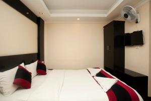 Voodi või voodid majutusasutuse Kathmandu Regency Hotel toas
