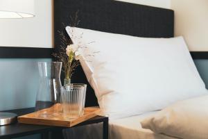 Rúm í herbergi á Pop Up Hotel Krone Zürich