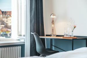 Rúm í herbergi á Pop Up Hotel Krone Zürich