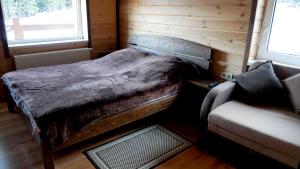 Postel nebo postele na pokoji v ubytování Hirska Kazka