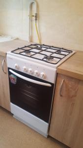 Kuchyňa alebo kuchynka v ubytovaní Best Apartment Naukova
