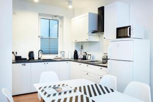 Kuchnia lub aneks kuchenny w obiekcie Apartment Zamojska 8 - Apartamenty GKM Lublin