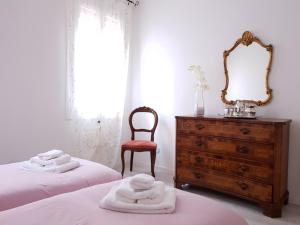 Posteľ alebo postele v izbe v ubytovaní Ca' dea Gondoea