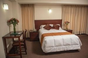 Ένα ή περισσότερα κρεβάτια σε δωμάτιο στο Hotel Ferrua +25 φωτογραφίες