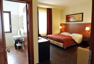 Letto o letti in una camera di Gullo Hotel