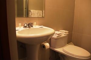 Um banheiro em Hotel Ferrua