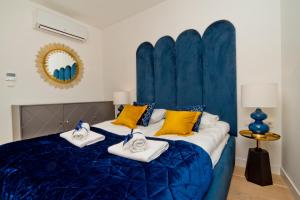
Łóżko lub łóżka w pokoju w obiekcie Zatoka Komfortu BlueApart Jastarnia
