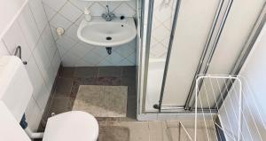 Kúpeľňa v ubytovaní Vár-Lak Apartman