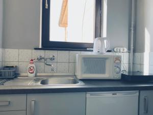Kuchyňa alebo kuchynka v ubytovaní Vár-Lak Apartman
