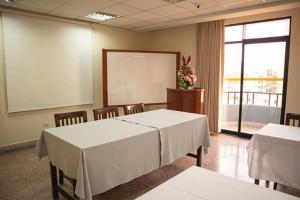 Área de negócios e/ou sala de conferências em Hotel Ferrua