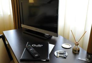 TV o dispositivi per l'intrattenimento presso Gullo Hotel