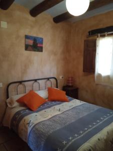 מיטה או מיטות בחדר ב-Masico Santana
