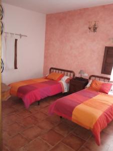 A bed or beds in a room at Masico Santana
