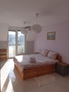 A bed or beds in a room at Malavi Square top center apartment! Comfort&clean!