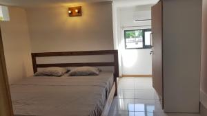 Postel nebo postele na pokoji v ubytování Modernes Apartment & Pool mit Mega Aussicht