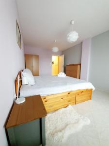 A bed or beds in a room at Malavi Square top center apartment! Comfort&clean!