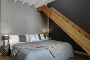 Ein Bett oder Betten in einem Zimmer der Unterkunft Duplex Lux Escudo del Carmen