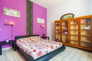 Posteľ alebo postele v izbe v ubytovaní Villa Vacanze Giuseppe