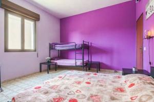Posteľ alebo postele v izbe v ubytovaní Villa Vacanze Giuseppe