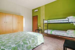 Posteľ alebo postele v izbe v ubytovaní Villa Vacanze Giuseppe + 37 fotografií