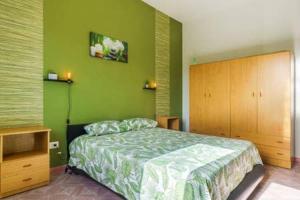 Posteľ alebo postele v izbe v ubytovaní Villa Vacanze Giuseppe
