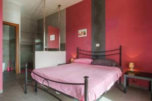 Posteľ alebo postele v izbe v ubytovaní Villa Vacanze Giuseppe