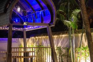 a room with a ceiling with blue lights at Comfosya BBQ Pool Villa near Jomtien Beach in Na Jomtien