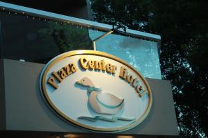 a sign for a horse center living with a duck on it at Plaza Center Hotel in São Lourenço do Sul