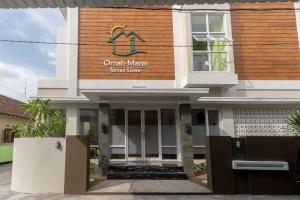 a building with the entrance to a transplant center at Omah Manis in Yogyakarta