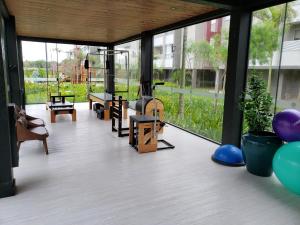 Γυμναστήριο ή/και όργανα γυμναστικής στο Apartamento em frente à praia do Campeche