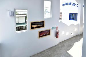 TV a/nebo společenská místnost v ubytování Jinlun Creative Grocery store son homestay