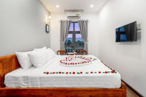 Una cama o camas en una habitación de Bamboo Hotel
