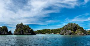 a view of halong bay from a boat at Skylodge Resort in Coron