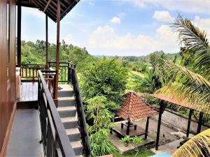 a view from the balcony of a house at Astana Swaha Estate in Sidemen