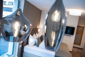 TV a/nebo společenská místnost v ubytování MANNI village - lifestyle apartments