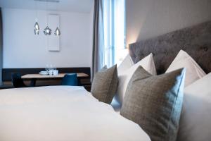 Postel nebo postele na pokoji v ubytování MANNI village - lifestyle apartments