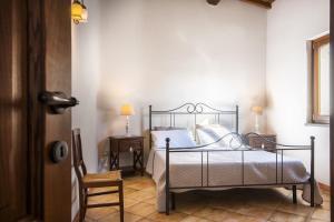 Postel nebo postele na pokoji v ubytování Poggio delle Api + 20 fotografií