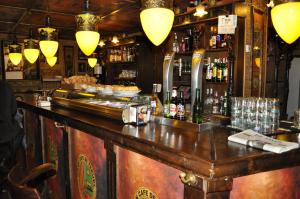 Loungen eller baren på Hostal Alcazaba