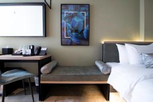 Postel nebo postele na pokoji v ubytování Hotel NuVe Elements