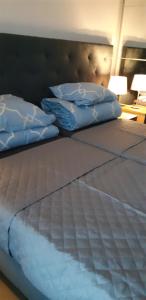 Posteľ alebo postele v izbe v ubytovaní Apartament 4 osobowy w Bel Mare