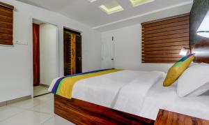 Itsy Hotels Dew Dreams客房内的一张或多张床位