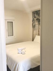 Postel nebo postele na pokoji v ubytování JUST To SLEEP 2 BEDROOMS APARTMENTS