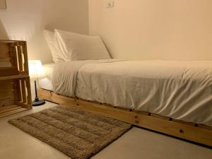Cama o camas de una habitación en PlainStay Hostel
