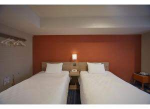 Postel nebo postele na pokoji v ubytování Sunshine City Prince Hotel Ikebukuro Tokyo
