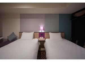 Postel nebo postele na pokoji v ubytování Sunshine City Prince Hotel Ikebukuro Tokyo