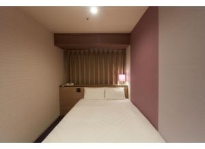 Postel nebo postele na pokoji v ubytování Sunshine City Prince Hotel Ikebukuro Tokyo