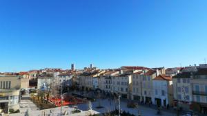 an aerial view of a city with buildings at Hotel Relais Du Postillon in Antibes