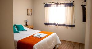 Кровать или кровати в номере CasaGrande Hotel
